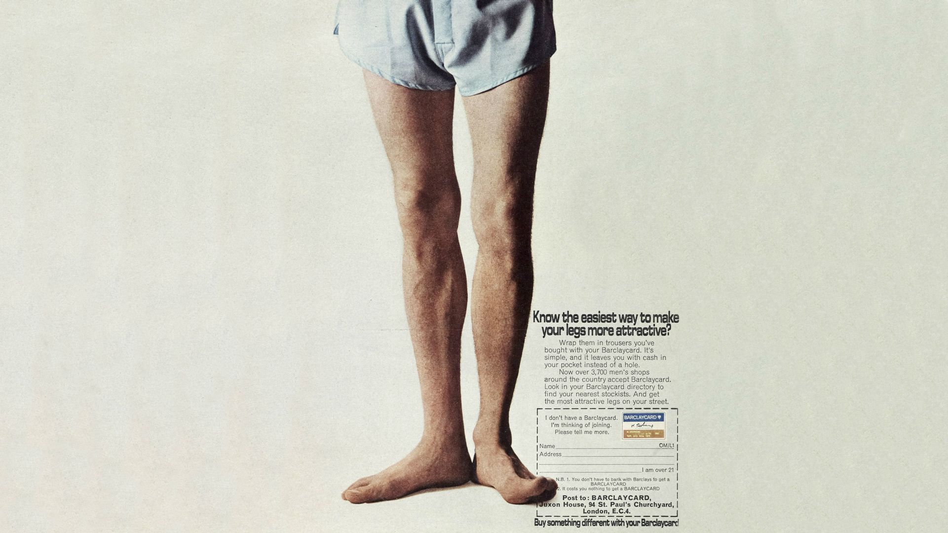 An old Barclays advert with a pair of male legs. The advert reads: "know the easiest way to make your legs more attractive?"